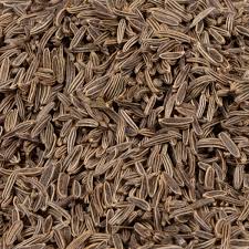 Close-up of organic Shahi Jeera (caraway seeds) in a wooden bowl – aromatic black cumin seeds used in Indian cooking and Ayurvedic remedies.